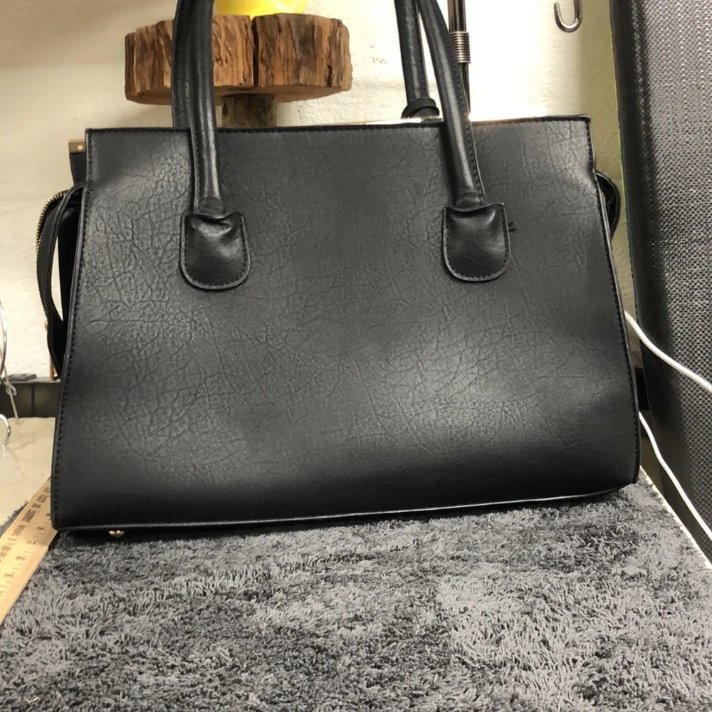 Black leather Satchel with matching wristlet‎ new without tags